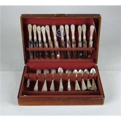 72-PIECE CASED STERLING FLATWARE SET BY STIEFF IN THE “ROSE” PATTERN.