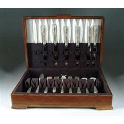 CASED STERLING THIRTY-EIGHT PIECE FLATWARE SET BY STATE HOUSE IN THE “INAUGURAL” PATTERN.