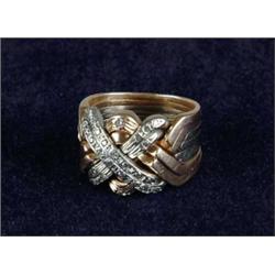14KT YELLOW, WHITE GOLD AND DIAMOND MAN’S DOUBLE TURKISH PUZZLE RING.