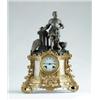 Image 1 : FIGURAL BRASS AND METAL MANTLE CLOCK.