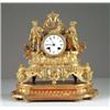 Image 1 : GILT METAL FIGURAL MANTEL CLOCK ON WOOD STAND.