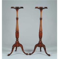 PAIR OF MAHOGANY TORCHERES.