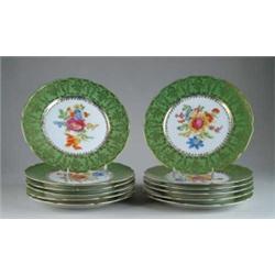 FINE SET OF TWELVE FLORAL DECORATED SERVICE PLATES.
