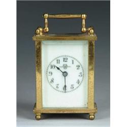 CASED MINATURE CARRIAGE CLOCK.  