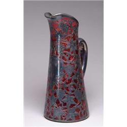 SILVER OVERLAY CRANBERRY GLASS PITCHER.