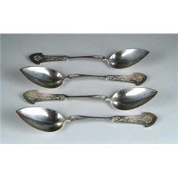 SET OF TWELVE STERLING GORHAM SPOONS IN THE “CORINTHIAN” PATTERN.