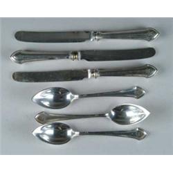 SET OF FOURTEEN PIECES OF STERLING SILVER BY DURGIN IN THE “ESSEX” PATTERN.