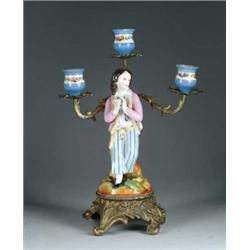 PORCELAIN AND ORMOLU FIGURAL CANDELABRA.