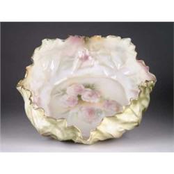 R.S. PRUSSIA CABBAGE LEAF BOWL WITH HAND PAINTED ROSES.