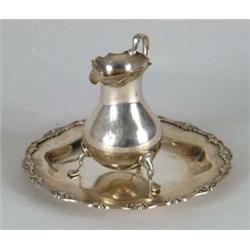 TWO PIECES OF STERLING SILVER.