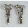 Image 1 : TWO SILVER PLATED GRAPE SHEARS.