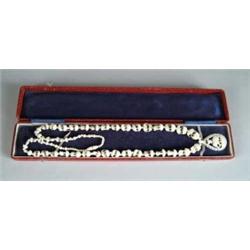 CARVED BONE ELEPHANT NECKLACE.