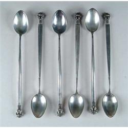 EIGHT GEORGE JENSEN ICE TEA SPOONS IN THE “ACORN” PATTERN.