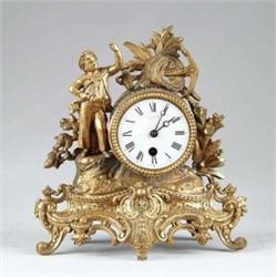 FIGURAL MANTLE CLOCK.