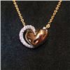 Image 1 : 18K Yellow Gold and Platinum Heart Necklace