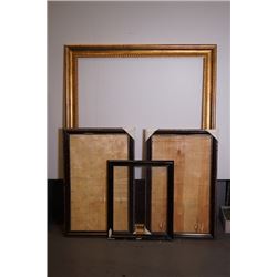 Four old picture frames.