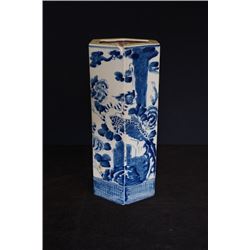 A Blue and White hexagonal hat stand.