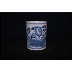 An early 20th century blue-and-white "flora" brush pot