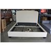 Image 1 : NEW ASHLEY TAN FABRIC KINGSIZE PLATFORM BEDFRAME WITH NAILHEAD ACCENTS RETAIL $1499