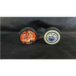 Lot Of 2 Pucks Oilers & Team Canada