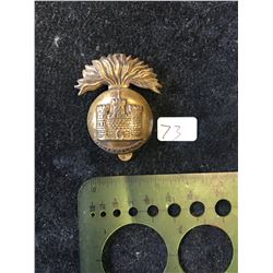 ROYAL INNISKILLING CAP BADGE.1914 FLAG TO THE LEFT