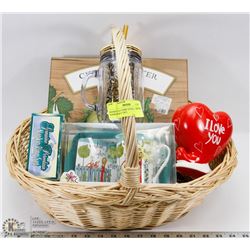 BASKET OF HOME ITEMS INCLUDING NAPKIN RING SET,