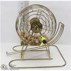 BRASS BINGO WHEEL W/ WOOD BINGO BALLS.