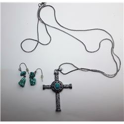 15)  LARGE SILVER TONE CARVED CROSS