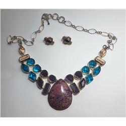 12)  VINTAGE LARGE PEAR SHAPED PURPLE