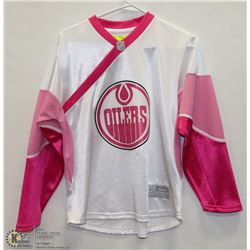 GIRL OILERS JERSEY SIZE 14.