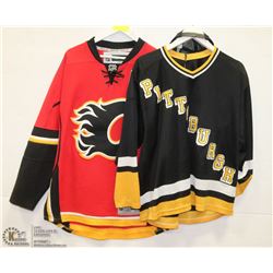 2 HOCKEY JERSEYS.