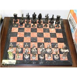 STONE CHESS BOARD WITH ROMAN THEMED PIECES, WITH