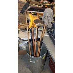 GARBAGE CAN W/ BROOMS AND SHOVELS