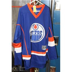 NEW OILERS SIZE S/M HOCKEY SHIRT