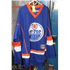 Image 1 : NEW OILERS SIZE S/M HOCKEY SHIRT