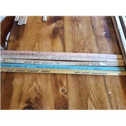 LOT OF 5 SASK ADVERTISING YARD STICKS (PENNANT, BURSTALL, SHAUNAVON, HEPBURN, SWIFT CURRENT)