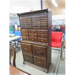 OAK OFFICE CABINET 63.5"X34X16.5"D ORIGINAL, 4 LG DRAWERS, 9 SM DRAWERS, 12 PULL OUT TRAYS, BRASS PU