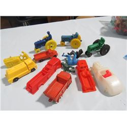 SACK OF TOYS W/PLASTIC TRACTOR