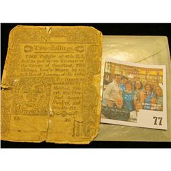 Two Shilling, 1776 payable 1781 Hartford, Connecticut, backed by a penmanship paper, tattered edges,