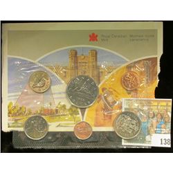 1986 Royal Canadian Mint Set, Six-piece. Original as issued. Envelope tattered on one edge.