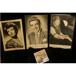 (3) different autographed B & W still Photos of famous Movie Stars including Ruth Hussey, Rocky Rock