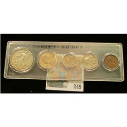 1934 Year Set of U.S. Coins Cent to half dollar in a Snaptight case.