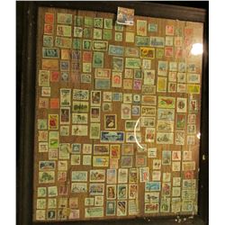20" X 24" Picture Frane with about 200 Used US. Stamps.
