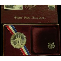 1984 S Olympics Proof Commemorative Silver Dollar in original box of issue.