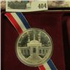 Image 2 : 1984 S Olympics Proof Commemorative Silver Dollar in original box of issue.