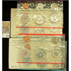 A pair of 1964 P & D U.S. Mint Sets, Original as issued in envelopes and cellophane.