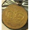 Image 2 : 22MM ROUND BRASS MEDAL WITH HOOP.THE REVERSE FEATURES A MAP OF THE WORLD & STATES 'BARRATT & CO'S SW