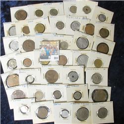 (40) CARDED FOREIGN COIN LOT FROM AROUND THE WORLD