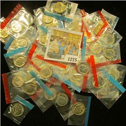 1275 _ (50) 1965-78 U.S Mint Single Roosevelt Dimes in original U.S. Mint Cellophane as cut from Min