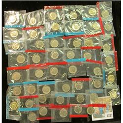 1277 _ (50) 1965-78 U.S Mint Single Roosevelt Dimes in original U.S. Mint Cellophane as cut from Min